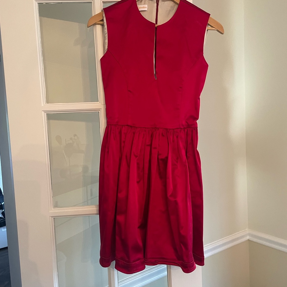 Satin red dress with grey interior and slit in the front